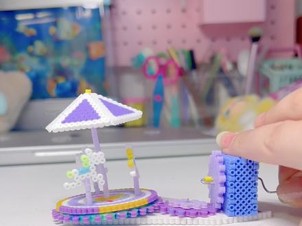 我做出了可以手摇的旋转木马🎠祝大家马年大吉! #当我染上了拼豆#我在抖音玩拼豆#拼豆人有自己的春节#立体拼豆 #手摇旋转木马