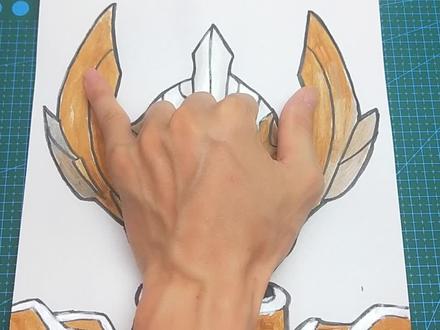 用手掌放在纸里手绘泰迦奥特曼光子地球形态,简单又帅气的手势画