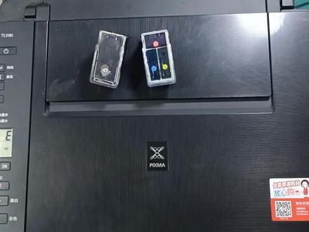 佳能打印机墨盒安装和拆下来的方法