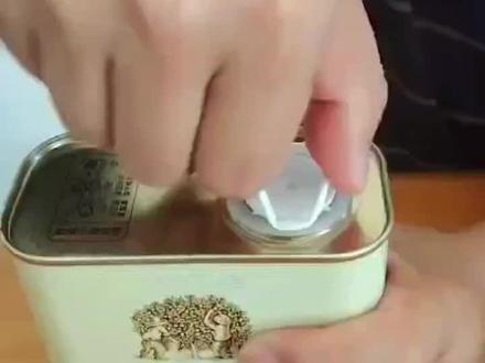 铁罐包装油
打开方法。