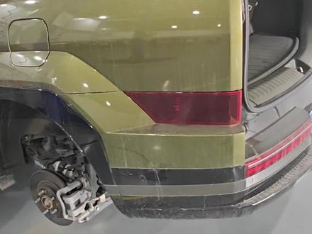 卸后轮千万注意别压到电子手刹线束