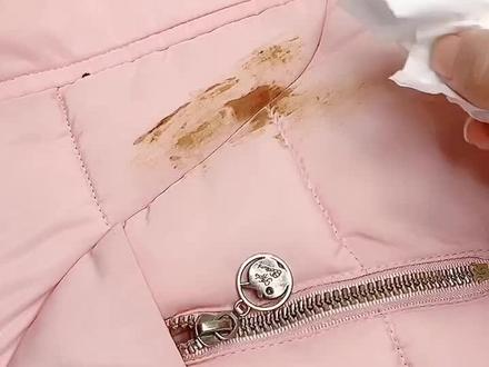 羽绒服粘到油污怎么办?教你一招