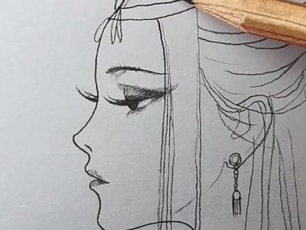 古风美女侧脸简笔画。