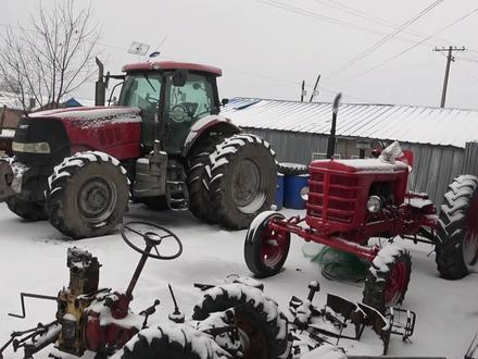 凯斯拖拉机换磨片修一回真费钱,分享拖拉机用这个设备能蓝牙听歌#大马力拖拉机 #传凯 #春天