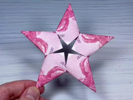 用纸币折纸镂空五角星,好看超简单还能像飞镖玩,创意手工制作
#创作灵感 #镂空五角星 #折纸 #手工