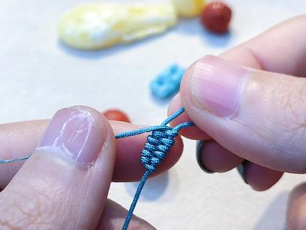 快速编织老祖宗留下的凤尾结,慢动作来了,喜欢收藏#凤尾结 @DOU+小助手