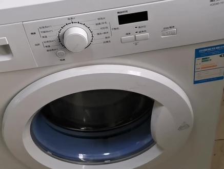 海尔滚筒洗衣机显示Err7把这个配件换了立马解决!#家电维修