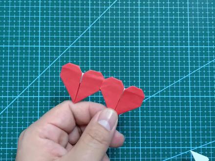 一张纸折的双爱心折纸教程,丘比特之箭穿两个爱心,快去折一个吧#折纸 #折纸教程 #手工 #折纸双爱心 #创意手工折纸 #创意折纸