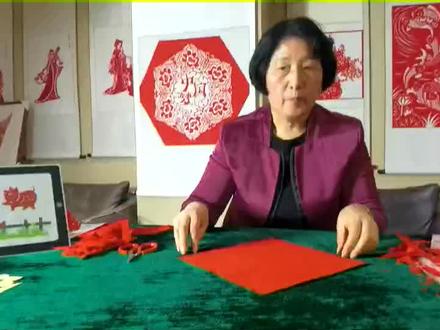 传授剪纸艺术, 弘扬民族文化 。 五折剪《红心向党》
