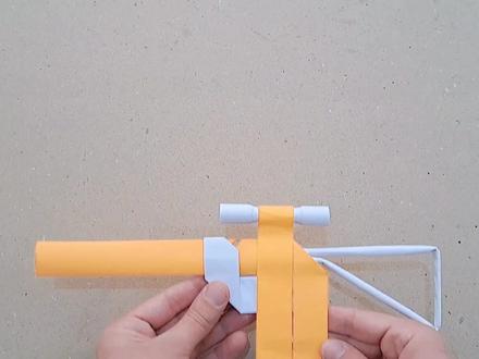 今天我们来制作折纸橡皮筋玩具枪! #折纸玩具 #折纸枪 #创意折纸 #抖音折纸