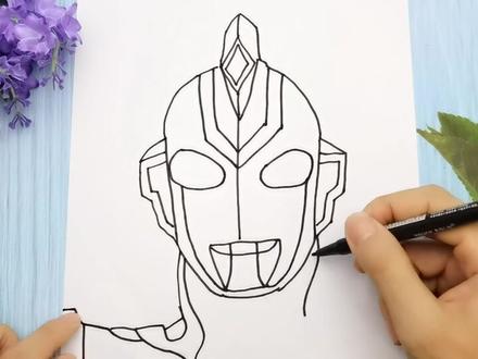 用手掌放在一张纸手绘泽塔奥特曼,简单又帅气的手势画