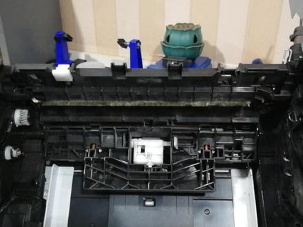 兄弟1618一体机不上纸,提示卡纸。原因是这个零件出问题!