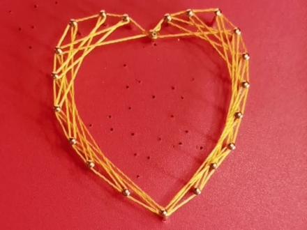 心形花边钉子画缠绕教程