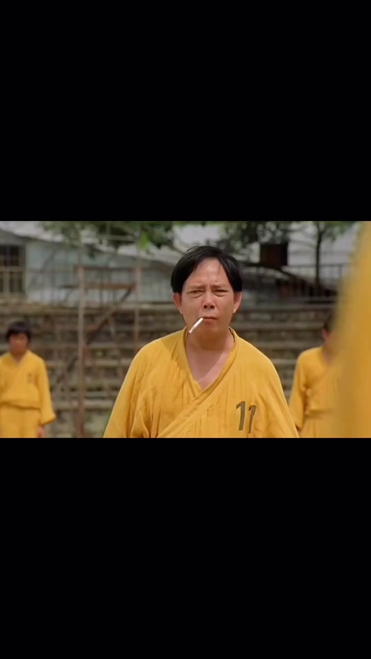 少林足球铁头功扮演者_少林足球铁头功唱歌那一段