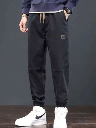#好物推荐🔥 这款男士宽松来脚哈伦运动#工装长裤 穿在身上时尚帅气#男士休闲裤 #品牌男装 #潮流穿搭 @抖音小助手