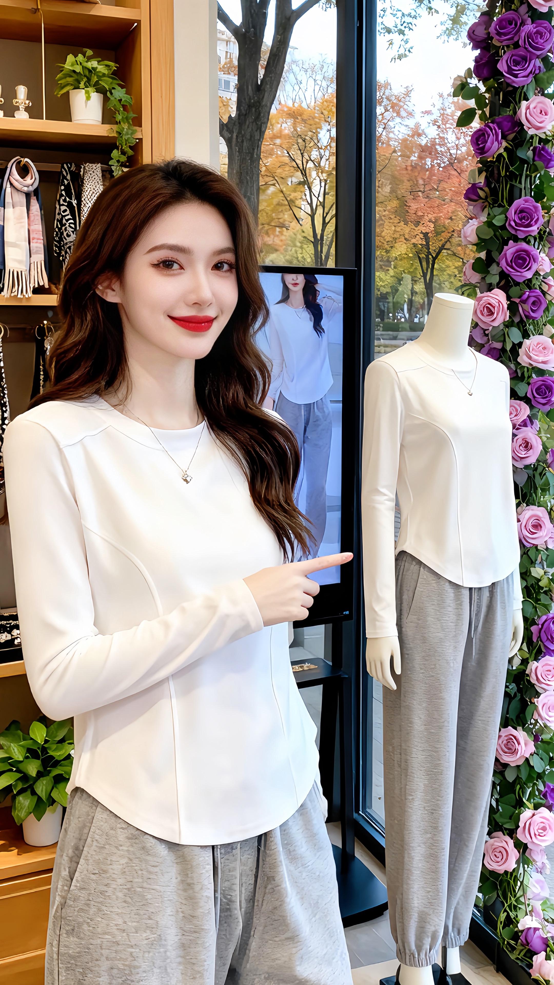 《一件打底衫的“多维优雅”》  当磨毛的温柔遇上拼接的巧思,这件打底衫便成了秋冬衣橱的“气质引擎”。立体剪裁勾勒身形,磨毛面料裹挟暖意,拼接细节暗藏设计心机,让简约不再单调。  28岁的东方女性身着它,在高级服饰店的暖光里,或是静阅书卷,或是与萌宠互动,亦或在落地窗前定格姿态——冷白肌肤与奶白衣身相得益彰,深棕长卷发随动作轻扬,每一面都写满“优雅不费力”。#高级感穿搭 #打底衫 #内搭外穿都好看 #时尚减龄穿搭 #秋冬穿搭 @抖加🔥上热门🔥dou+🔥热点宝 @DOU+上热门   它是秋冬穿搭的“百搭密码”,配休闲裤随性,搭西装裤干练,哪怕单穿也能靠质感出圈。在秋日店铺的光影中,它用拼接巧思与磨毛温度,重新定义打底衫的“时尚野心”,让你在每一个日常场景里,都美得独一无二。