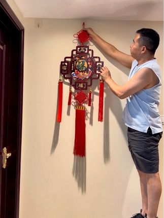 给大家推荐一款适合挂在客厅墙过道玄关的桃木中国结,好看喜庆! #创作者中心 #创作灵感 #客厅装饰画 #中国结挂件 #玄关