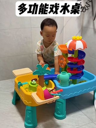 夏天就要给孩子安脸上一款#多功能戏水桌 双盆设计多种玩法 有水车旋转滑梯 跳水青蛙泳池 玩累了还可以钓鱼 还有洗菜餐具 切菜餐具 #过家家玩具 #洗碗机玩具循环出水