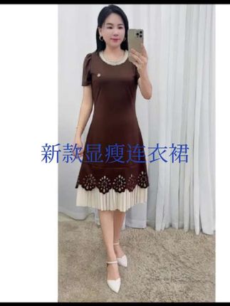 百花果2025夏季新款圆领连衣裙百褶裙镂空花边设计遮肉显瘦 #显瘦#夏季新款#休闲#洋气