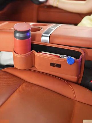 新款汽车座椅夹缝收纳盒,升级水杯位随手拿取奶茶保温杯,小身材大容量不占空间! #汽车用品# 汽车座椅收纳盒 #座椅缝隙储物盒# 理想l9 @DOU+小助手 #新款汽车座椅夹缝收纳盒升