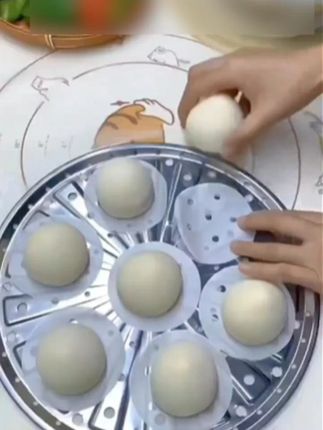 9.9元超值1000张9厘米一次性蒸笼垫纸,一个包子垫一张,比蒸笼布好用多了