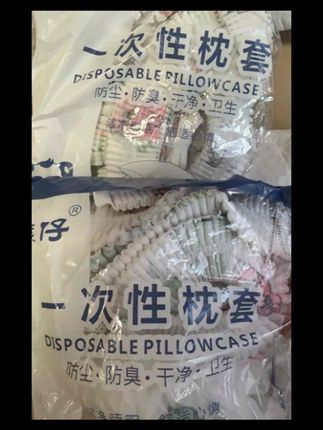 一次性枕头套酒店出差必备用品火车卧铺便携旅行隔脏枕头保护套