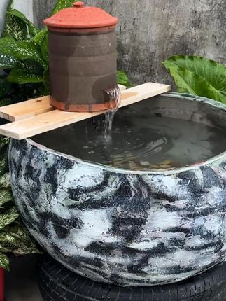 瑜伽球为模涂水泥,装滤水设备养观赏鱼成鱼缸