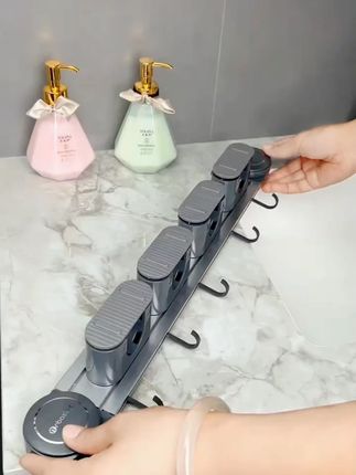 #吸盘拖把壁挂夹扫把拖布免打孔挂钩固定神器卫生间浴室门后置物架