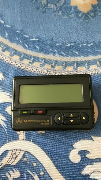 摩托罗拉顾问中文寻呼机。为了当闹表,手机有时闹钟不响。