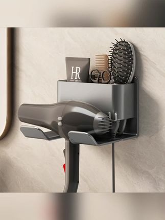 很多东西只有买了之后才知道不好。你看这个塑料的,松松垮垮的还不高级,把它换成这种铝合金的质感一下就上来,能挂吹风机,能放剃须刀,也能放个洗面奶,看这里还有防刮的胶条,这才能配得上你家的浴室吗?