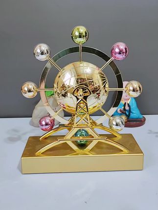 轻轻一拨就可以摇摆好几个月,需要安装电池#摩天轮摆件 #永动摆件 #桌面摆件