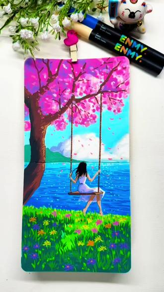 画了一幅治愈系的春日樱花 #春天的色彩 #拥抱春天主题画 #治愈系绘画 #恩米匀彩小黄本 #恩米丙烯马克笔 @抖加🔥上热门🔥dou+🔥热点宝 @抖音艺术 春天的色彩太丰富了,春天的风景太美好了,春天的天气也格外晴朗,怎么能辜负这美好的春日时光呢?所以青春的少女走出户外,来到樱花树下荡起了秋千,享受这美好的时光,这幅画色彩亮丽,充满生机与阳光,让人心情愉悦,仿佛在和画中少女一起享受温暖的阳光,一起荡起秋千,欢歌笑语,马克笔画的这幅画面虽然不大,但是意境很美很治愈,喜欢画画的小伙伴赶快拿起画笔,一起来描绘这个美好的大自然,一起拥抱开满鲜花的春天!