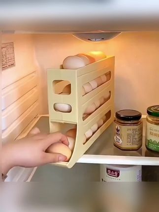🥚 滑梯式鸡蛋收纳盒: ,自动滚蛋设计,取一补一超省心! ,食品级材质防尘防碎,多层叠放省空间。 ,告别冰箱杂乱,保鲜防摔更安心!#好物推荐🔥 #滑梯式鸡蛋收纳盒