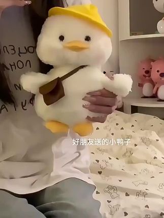 趣巢呆呆鸭正版原创声控歪头玩偶唱歌复读学舌电动毛绒玩具公仔