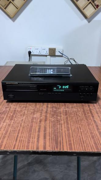 马兰士CD-40发烧CD机 出一台原装进口比利时产的马兰士CD-40发烧CD机,整体成色不错,使用原装220V/240V电压,经典发烧机CD机,采用大名鼎鼎的飞利浦CDM4不死光头、飞利浦SAA7220P/B+TDA1541A R1解码,经典暖声发烧CD机,配件有马兰士CD机通用遥控器一个、1.5米电源线一条!读碟秒杀,不管是盗版,刻录,正版都秒过!能读天下碟!解析力高,声音暖和而细腻,声音层次分明!值得购买!下图是实拍的图片。(注意:二手商品难免有瑕疵,完美主义者绕道,不以音色喜好和成色作为理由退货,拒绝到手刀,请想好再拍下!欢迎自提!路远的发德邦快递邮费到付。)