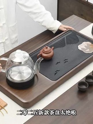 2025新款茶盘来袭,轻奢设计提升家居格调。家用办公室两相宜,现代简约风格百搭不挑空间。干泡茶台托盘一体,泡茶更便捷。高档材质打造,耐用又显品位,让每一杯茶都充满仪式感。#茶盘推荐 #上热门