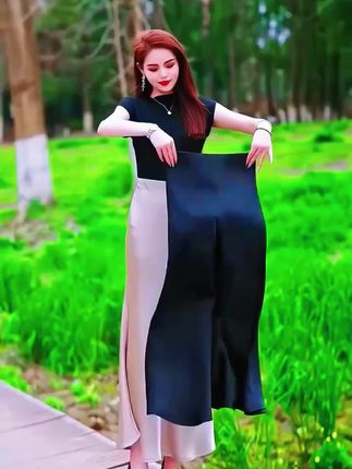 哇!这条裙子太美了,把丝绸穿在身上的高级感高腰a字剪裁搭配鱼尾下摆,前短后长设计优化比例,醋酸双面缎面料,丝滑垂坠,行走街如流水般摇曳,藏胯显瘦又显腿直。冰感材质,三十八摄氏度,穿也不闷汗。黑茶鹤米白三色百搭高级。侧边隐形拉链加手工包边,细节拉满质感。#显瘦显高显气质 #时尚百搭