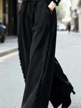 宽松阔腿裤黑色牛仔裤女休闲裤显瘦大码松紧高腰休闲拖地毛边裤子