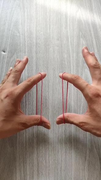 #魔术教学#魔术揭秘 一根橡皮筋瞬间变两根,怎么做?