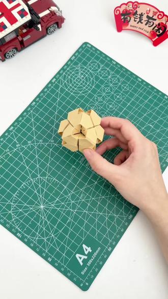 教你用纸张折一个立体花球,简约又好看,一起试试吧 #手工折纸 #创意手工 #手工制作 #手工 #花球