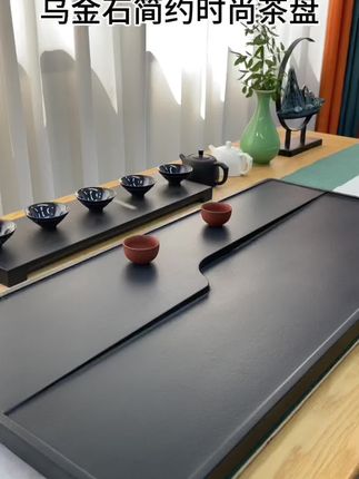 闲庭独坐对闲花,轻煮时光慢煮茶。不问人间烟火事,任凭岁月染霜华。纯天然乌金石简约时尚石茶盘,高颜值高性价比。#石茶盘 #茶生活 #高端茶器 #召唤茶友 #原创