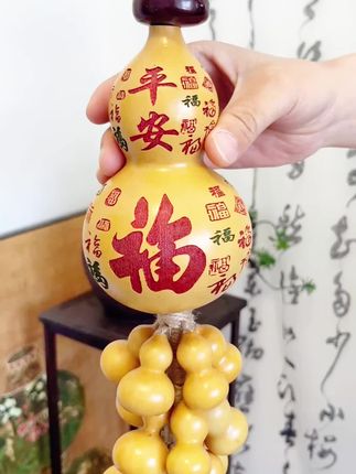 客厅玄关入户走廊背景墙都适合悬挂的一款天然葫芦串挂件寓意特别好,挂起来还特别大气 葫芦寓意#福禄 #葫芦串 #玄关 #店里挂件