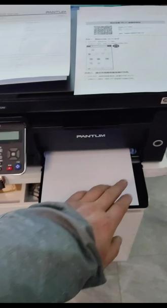 奔图打印机怎么连网和卡纸怎么取出。