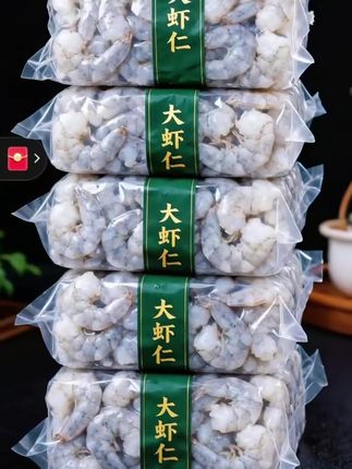 谁懂爱吃虾星人的痛,剥壳去虾线太麻烦!来试试这款免处理大虾仁,产自纯净海域,活虾现剥,每只都由人工精心去壳去虾线 ,干净又卫生。它含冰率极低,肉质紧实Q弹,一口咬下去,满满的大海鲜味。无论是清蒸、爆炒还是做汤,都鲜香无比,简单几步,美味上桌,厨房小白也能秒变大厨!#快来一起尝个鲜 #好食材好味道 #健康美食