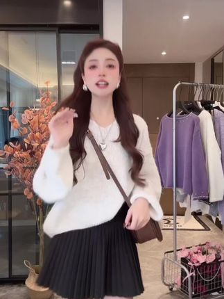 毛呢半身裙女春秋冬2025新款学生复古高腰百褶A字宽松休闲短裙子