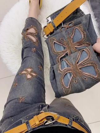 秋季蓝色镂空直筒牛仔裤